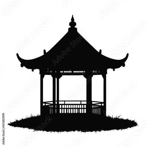 Black silhouette of a traditional Asian gazebo on grassy ground