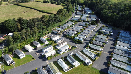 Modern caravan park from above with static homes and countryside views – perfect for tourism, real estate, and lifestyle projects.