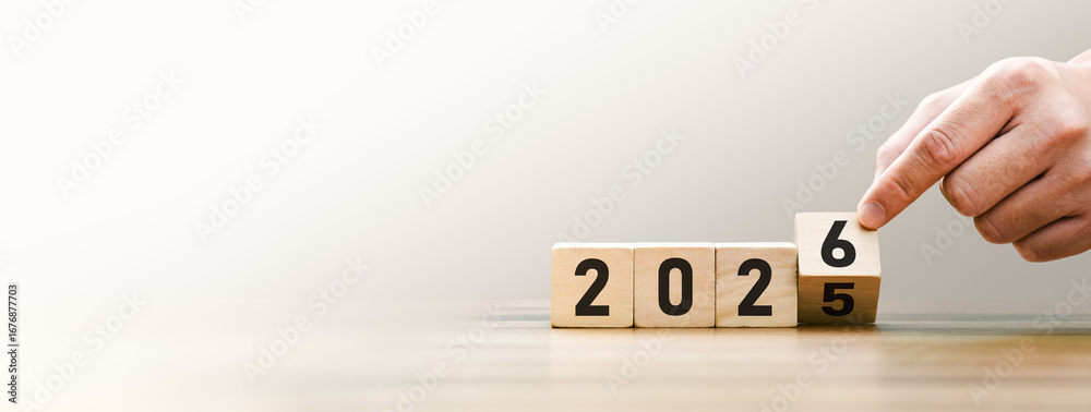 Transitioning from 2025 to 2026 with wooden blocks symbolizing target ...