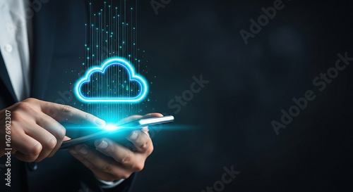 Man using smartphone with glowing cloud and data streams on dark background for cloud computing