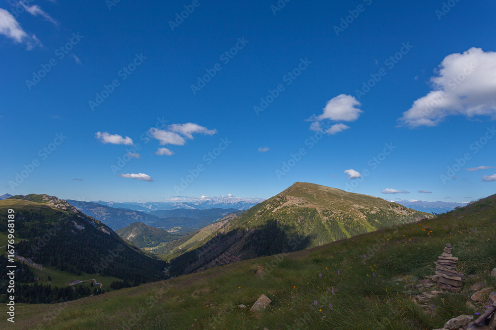 Fototapeta premium Summer panorama of Pala di Santa Peak summit seen from path to Latemar summit. UNESCO world heritage site, Trentino-Alto Adige, Italy, Europe