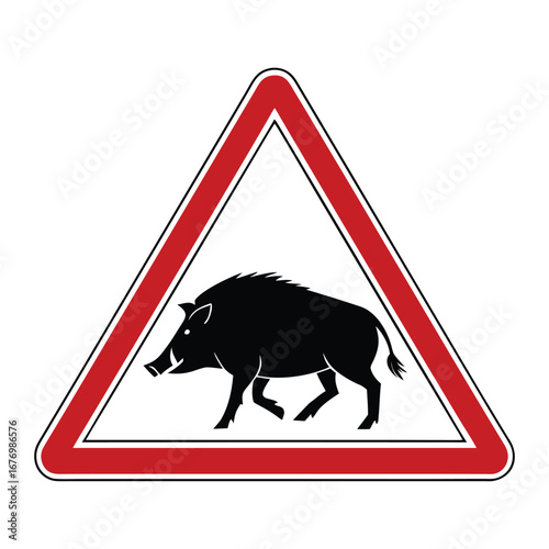 Warning sign for wild boar crossing ahead on rural roads, indicating caution for drivers to prevent potential animal collisions and ensure road safety