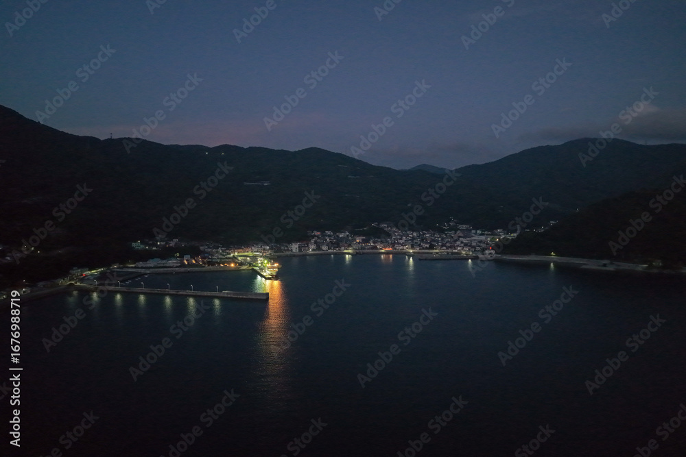 Naklejka premium Night View of Iyo Misaki Port (伊予三崎港) and Town Lights, Ehime, Japan