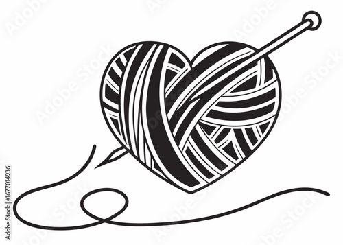Heart shaped yarn ball with knitting needle