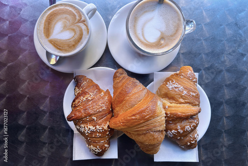 cup of coffee with croissants