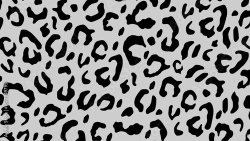 Grey and black leopard skin texture. Animal print background. Luxury wallpaper.