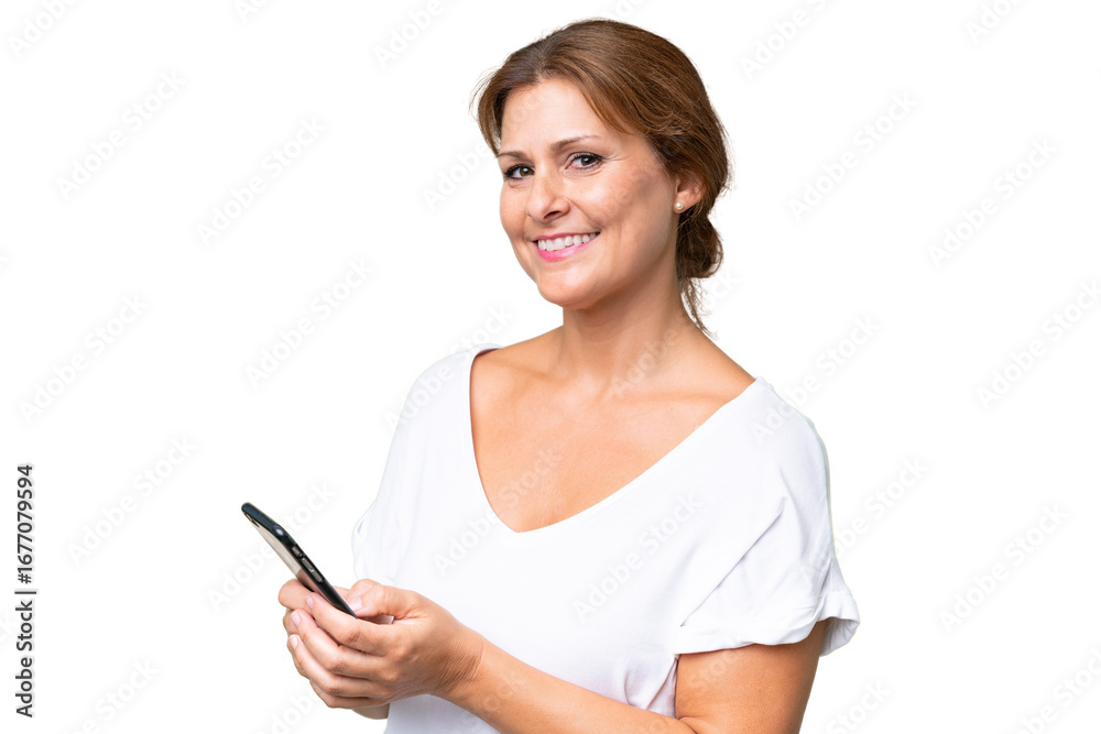 Middle-aged caucasian woman over isolated background sending a message or email with the mobile Middle-aged caucasian woman over isolated background sending a message or email with the mobile