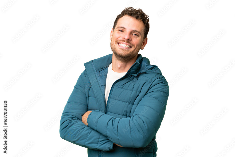 Brazilian man over isolated chroma key background with arms crossed and looking forward