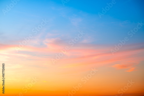 Beautiful , luxury soft gradient orange gold clouds and sunlight on the blue sky perfect for the background, take in evening,Twilight, Large size, high definition landscape photo
