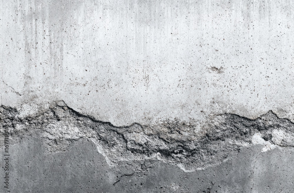 Obraz premium Weathered concrete wall with cracks