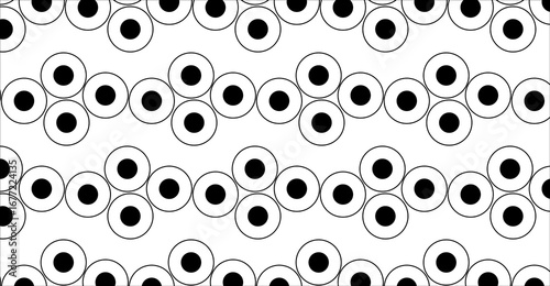 A vibrant seamless pattern featuring evenly spaced white polka dots on a bold black and white background. This eye-catching design is perfect for use in textiles, wallpapers, digital backgrounds.