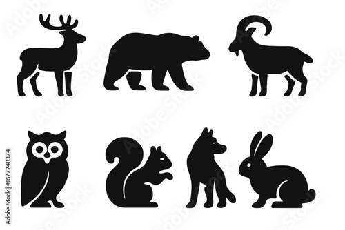 Mountain wildlife and forest animals icon set. Solid black glyph collection of vector silhouettes. Includes deer, bear, mountain goat, owl, squirrel, wolf, and rabbit icons.