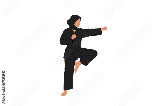 Focused Muslim Woman Practicing Martial Arts.