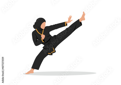 Powerful Woman in Hijab Performing a Martial Arts Kick.