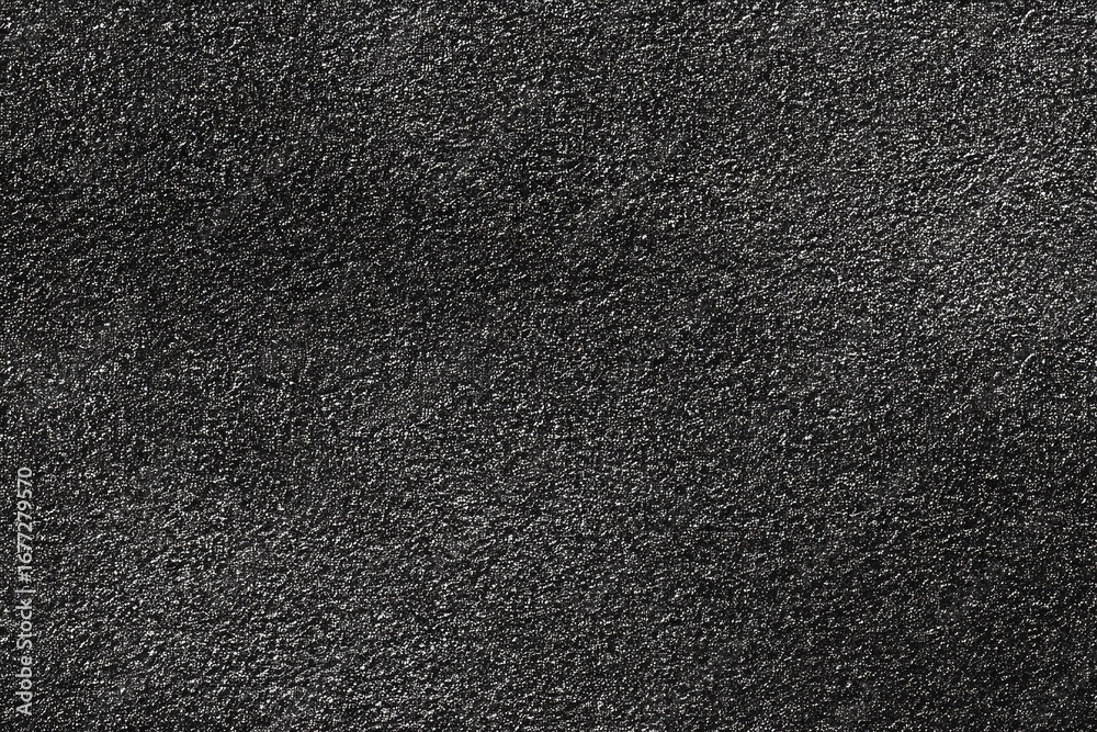 Obraz premium Dark gray textured surface, slightly reflective