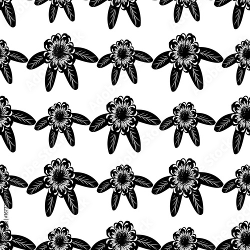 A striking black background showcases a repeating pattern of white intricate floral starbursts, offering a bold and elegant contrast.