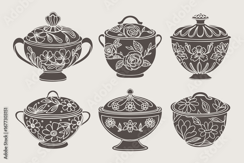Set of decorative ceramic sugar bowls with floral ornament. Set of vintage porcelain pots.