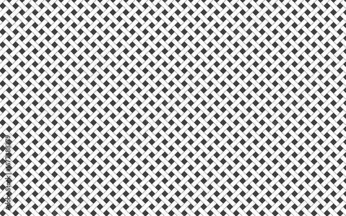 The image shows a repeating black-and-white pattern that resembles a woven or basket-like texture. It is made of a grid of small, interconnected black and white squares and rectangles are arranged.