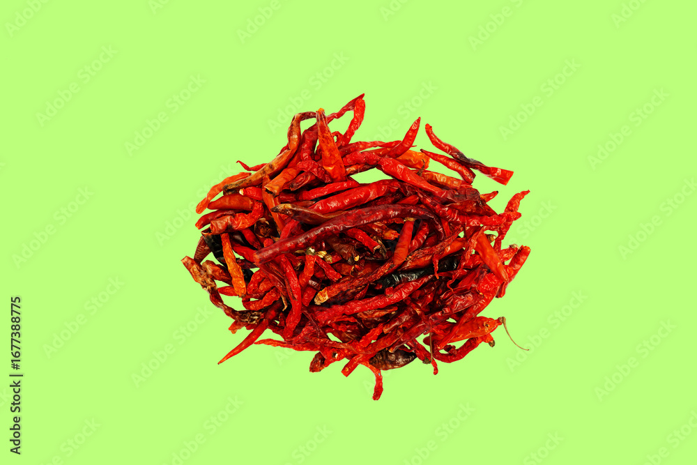 Naklejka premium Dried chili pepper, chillies spicy. Isolated on green Background