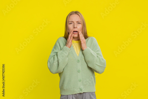 Fotografie Sad young Caucasian woman feeling hopelessness loneliness, nervous breakdown, loses becoming surprised by lottery results, bad fortune, loss unlucky news