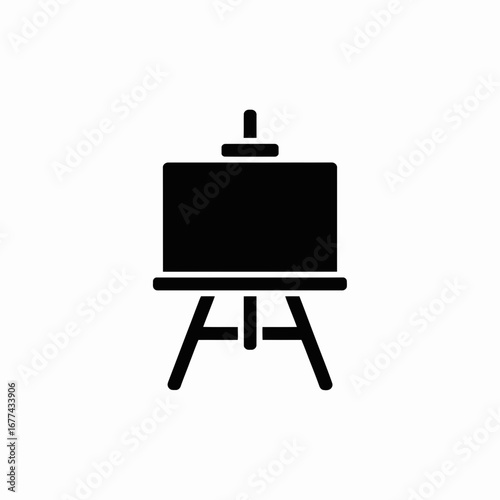 wooden easel with blank canvas