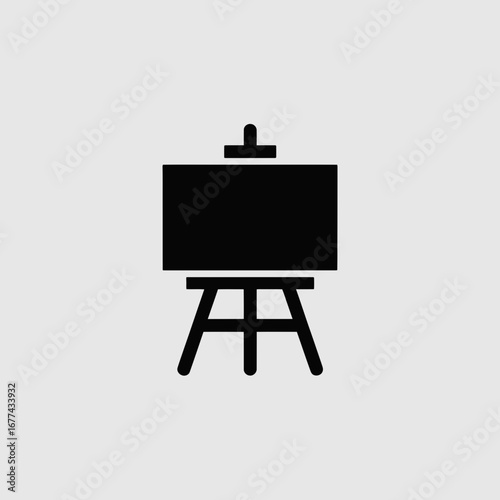 wooden easel with blank canvas