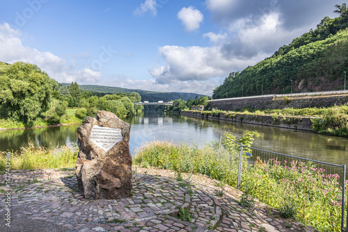Commemorative stone marking the meeting point of Werra and Fulda rivers in Hann Münden, Germany