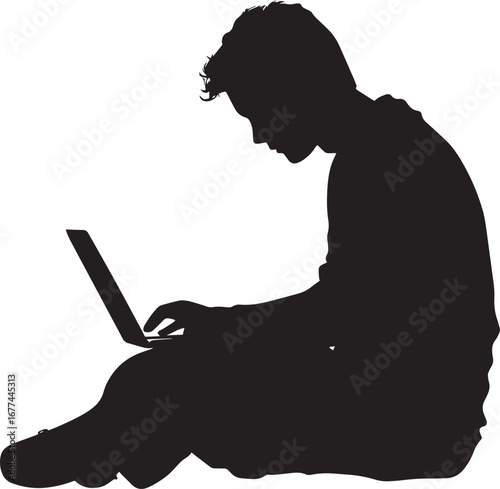A student sitting with a laptop, typing or researching online.