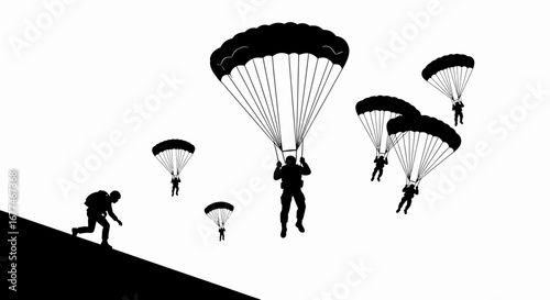 Silhouettes of skydivers descending with parachutes against a bright sky