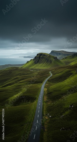 Winding Road Through Green Scottish Highlands Landscape