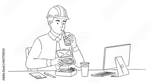 Engineer Enjoying a Lunch Break at His Desk with Laptop and Drink