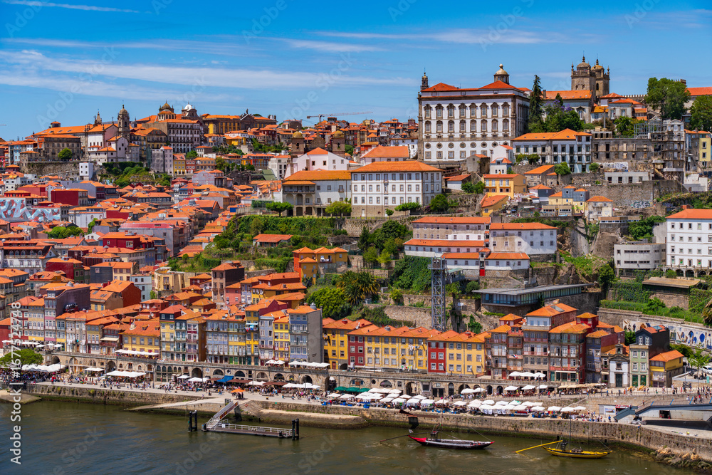 Fototapeta premium Cais da Ribeira, the riverfront area along river Douro in Porto, Portugal