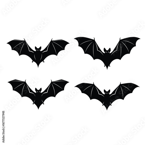 A set of four black flying bat silhouettes with wings outstretched, isolated on a white background.
