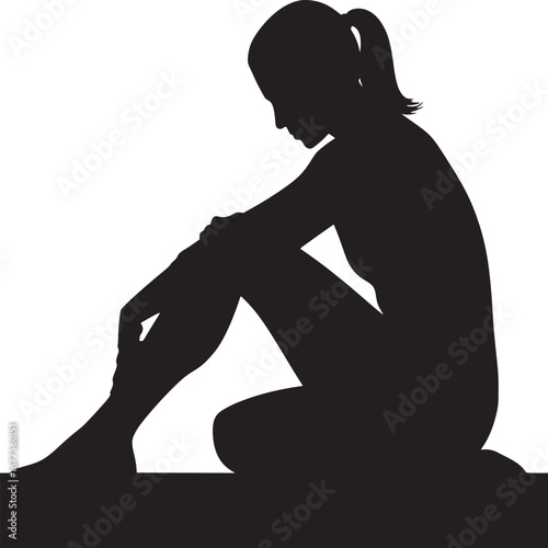 Silhouette of a woman sitting with her head down and arms around her legs in black and white art