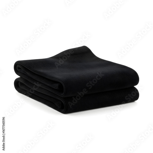 A folded black blanket is displayed against a white background, showcasing its soft texture and simple design.