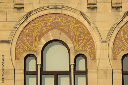 Photography mosaic of wild animals on the facade of a building in the zoo of Antwerp, Belgiu