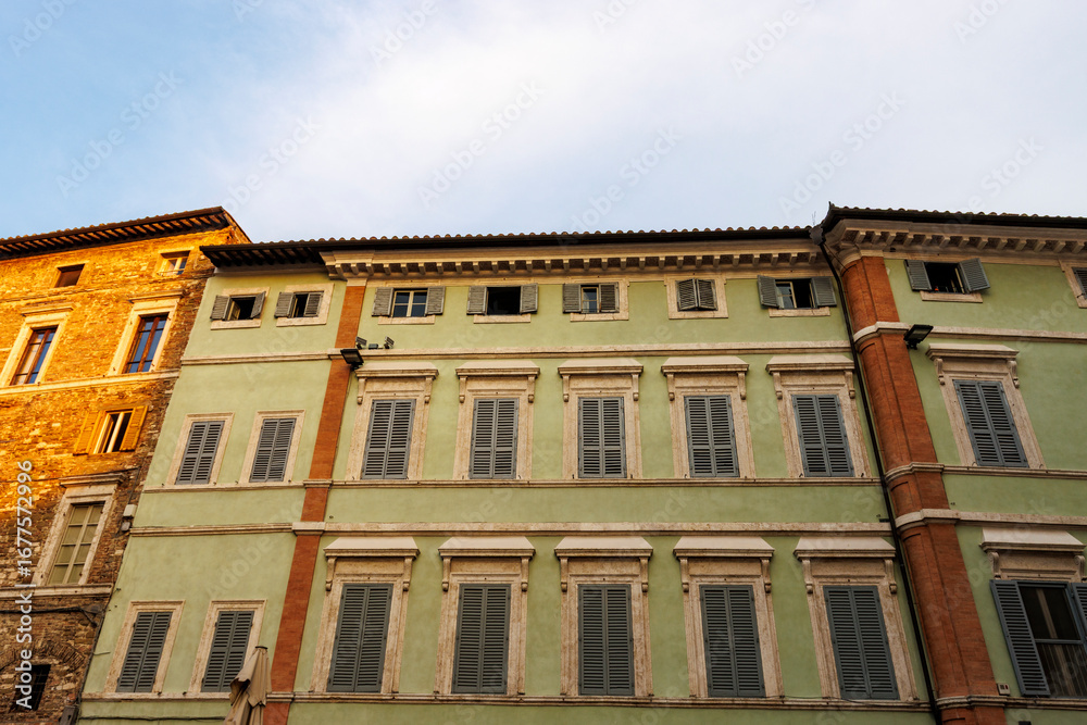 Fototapeta premium Facade of old houses in the historic center of Perugia, Umbria, Italy, Europe
