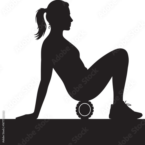 Silhouette of woman using foam roller for muscle relief and recovery during fitness routine on the floor