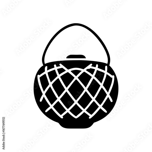 Monochrome image of a woven basket with handle for carrying items