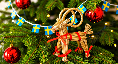 Straw Goat Placed on Christmas Tree Decorated With Swedish Flags Garland 