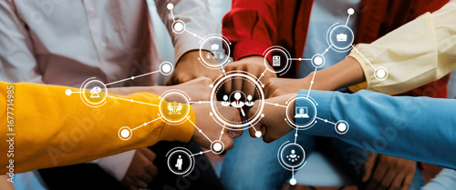Fotografi Startup company employee team stacking hand together symbolize successful group of business partnership and strong collective unity teamwork in community workplace in panoramic banner