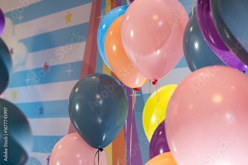 Colorful balloons decoration against a playful background, perfect for kids birthday party celebration