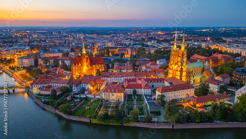 Night view of church of the Holy Cross and St Bartholomew and ca