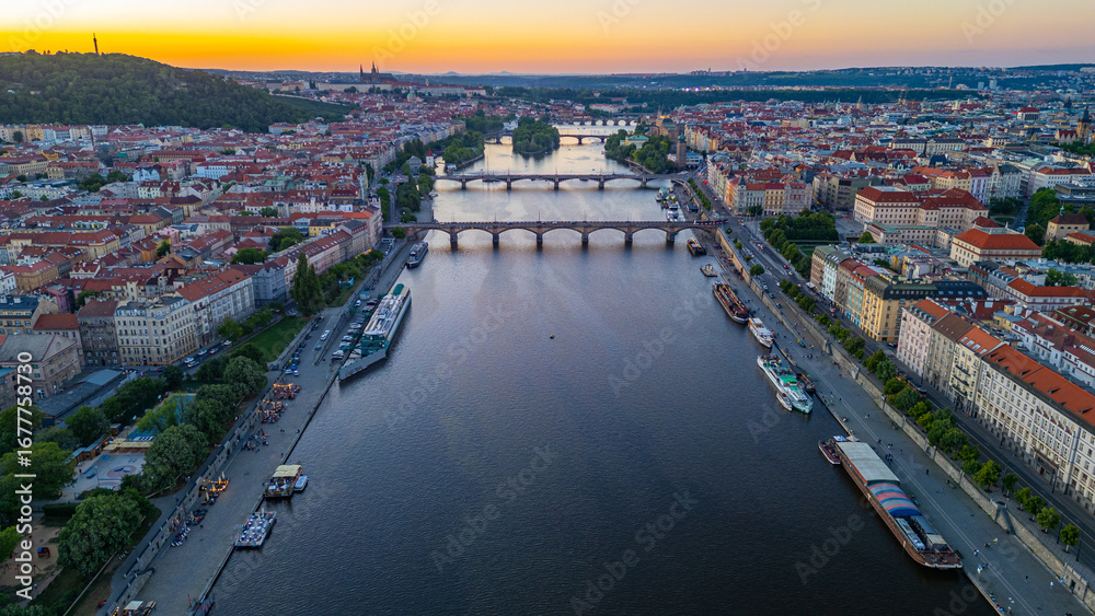 Obraz premium Sunset view of bridges at Vltava river in Prague, Czech republic