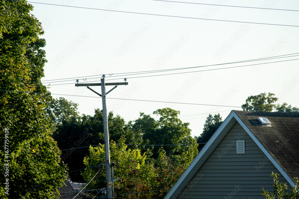 Obraz premium Power lines in the residential neighborhood 