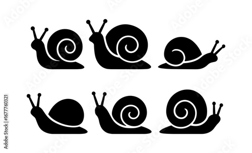 Silhouette snail icons collection in various poses with swirled shells