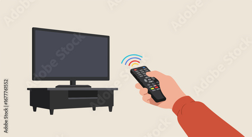 Hand holding remote control with television set in background. Remote control in use shows modern tv on stand, hand adjusts the volume.
