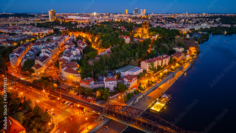 Fototapeta premium Sunset view of Vysehrad behind vyton bridge in Prague, Czech rep