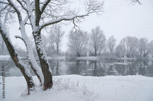 Frozen river on an early winter morning