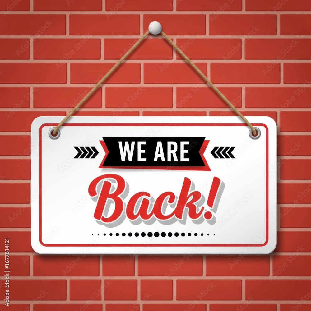 Obraz premium We Are Back Sign on Brick Wall.